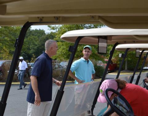 COL Robin Parsons (left) and COL Darby McNulty (right) share opening remarks with the golf teams before the start of the IPPS-A tournament.