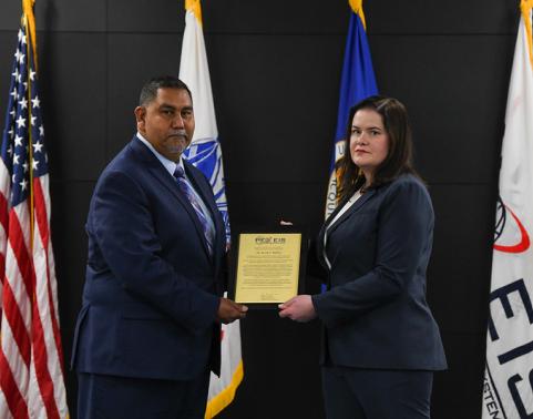 Sergio Alvarez with Sarah Mullins and certificate of charter