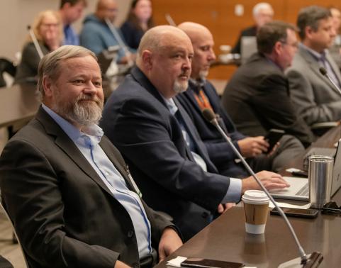 PEO EIS leaders attend summit in December 2023.