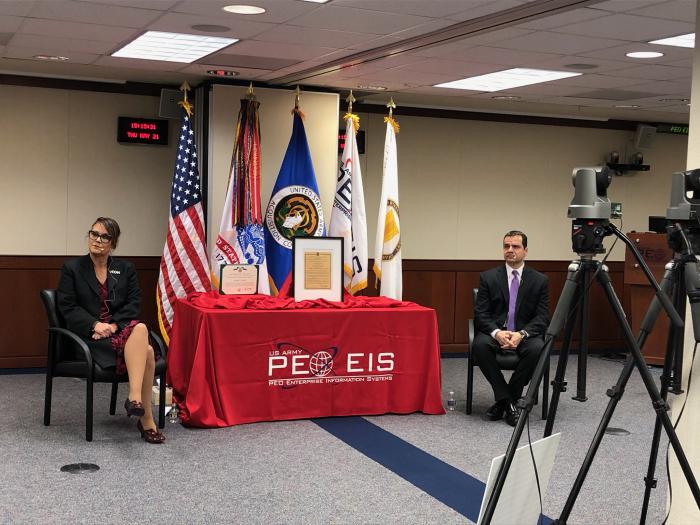 Ms. Smith and Mr. Guckert at PEO EIS change of charter ceremony