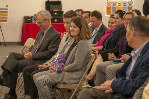 Joe Kobsar, Director Allied Cyber Technologies, presented his wife, Alexandra, with flowers, and thanked her for supporting his career for more than 30 years.