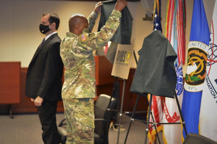 Colonel Burton unveiling DIBS logo