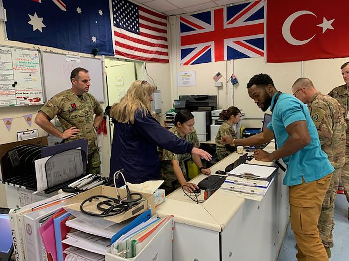 Medical providers register the very first patient encounters using HALO at the Role 2 hospital at Kabul, Afghanistan on Nov. 15, 2019. Since then over 1,000 patient encounters have been registered at the hospital using HALO.